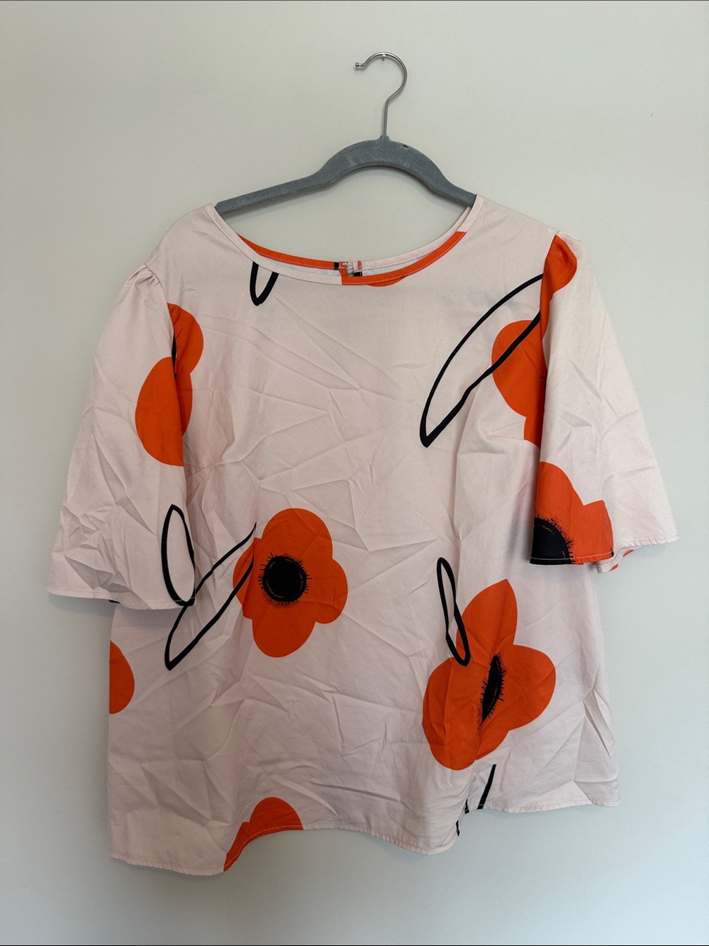 SHEIN Cream Blouse with Bold Orange Floral Motif